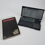Texas Instruments TI-74 Basicalc Programmable Calculator + Learn Guidebook. Fixed Price $125.00.