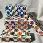 Boxed Set Of 4 Slick Ball Non-stick Minis From Oil Camo Rasta. Fixed Price $16.00.