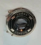 Kodak Anastigmat 105MM F/4.5 Lens With Compur Shutter. Fixed Price $99.00.