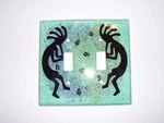 All Fired Up Canada Southwest Ceramic Kokopelli Double Switch Plate Cover. Fixed Price $12.99.