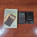 Hewlett Packard HP42S Rpn Scientific Calculator, Slip Case And Owner's Manual. Fixed Price $184.99.