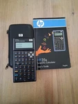 Hewlett Packard HP-35S Scientific Calculator With Case And Guide Book.. Fixed Price $300.00.