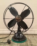 Antique 9" Diehl Oscillator, 4 Steel Blade, Cage, Cast Iron Body And Base. Fixed Price $199.00.