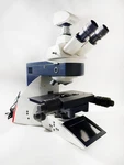 Leica DM5500 B Fluorescence Microscope, Motorized Stage, EL6000 Light Source. Fixed Price $3500.00.
