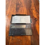 Texas Instruments TI-74 Basicalc Handheld Computer Vintage 1985 Calculator Case. Fixed Price $48.50.